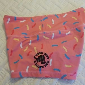 Feed Me Fight Me brand spandex workout shorts.